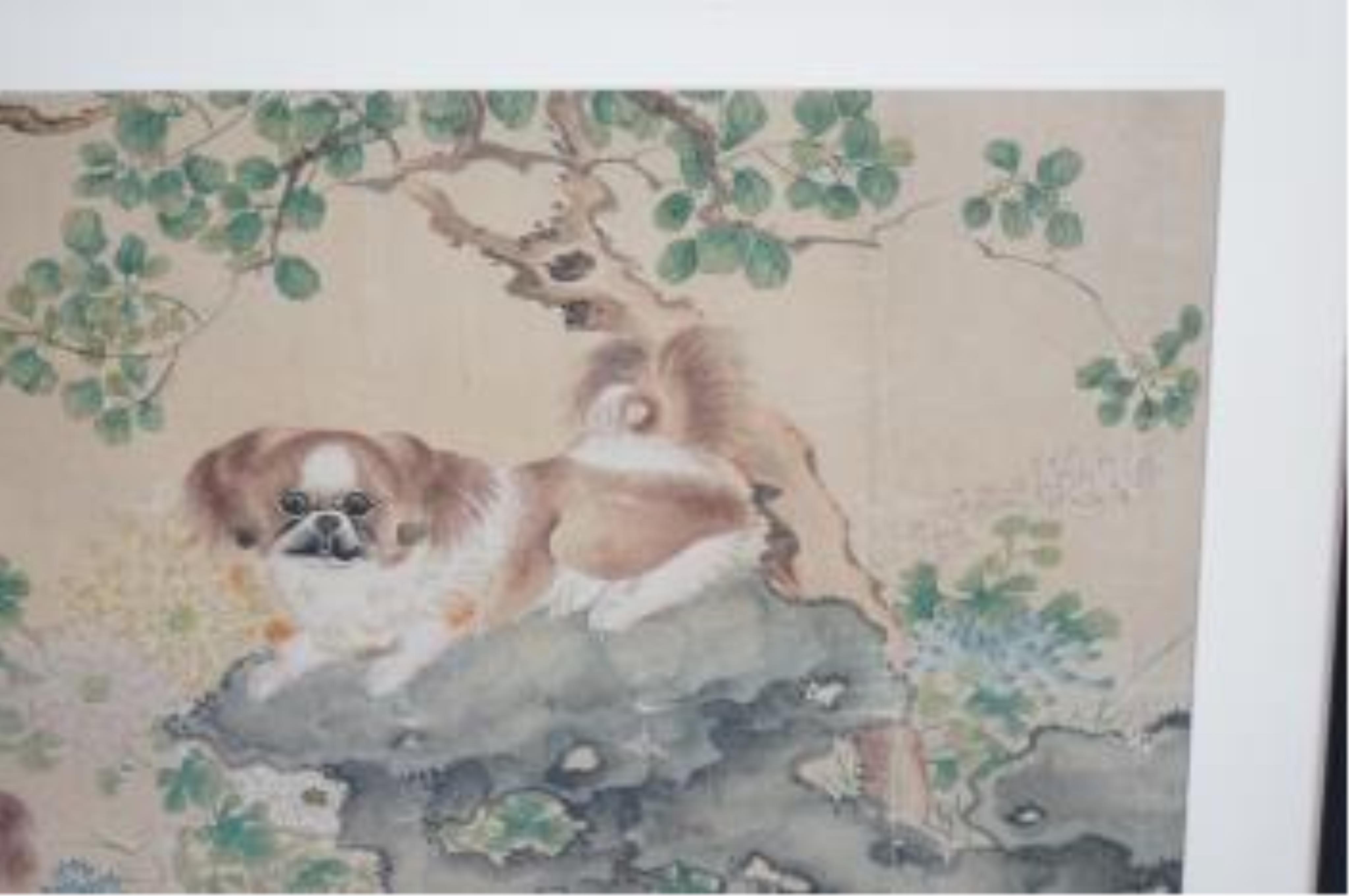 Late 19th/early 20th century, Chinese school, ink and colour on paper, Chi dogs in a rockwork garden, unsigned, 59 x 105cm. Condition - poor